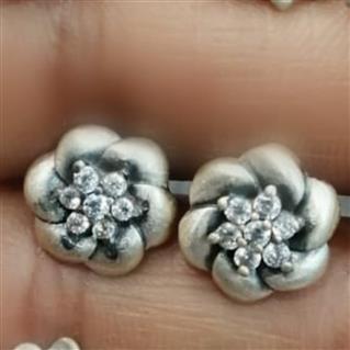 Silver floral studs