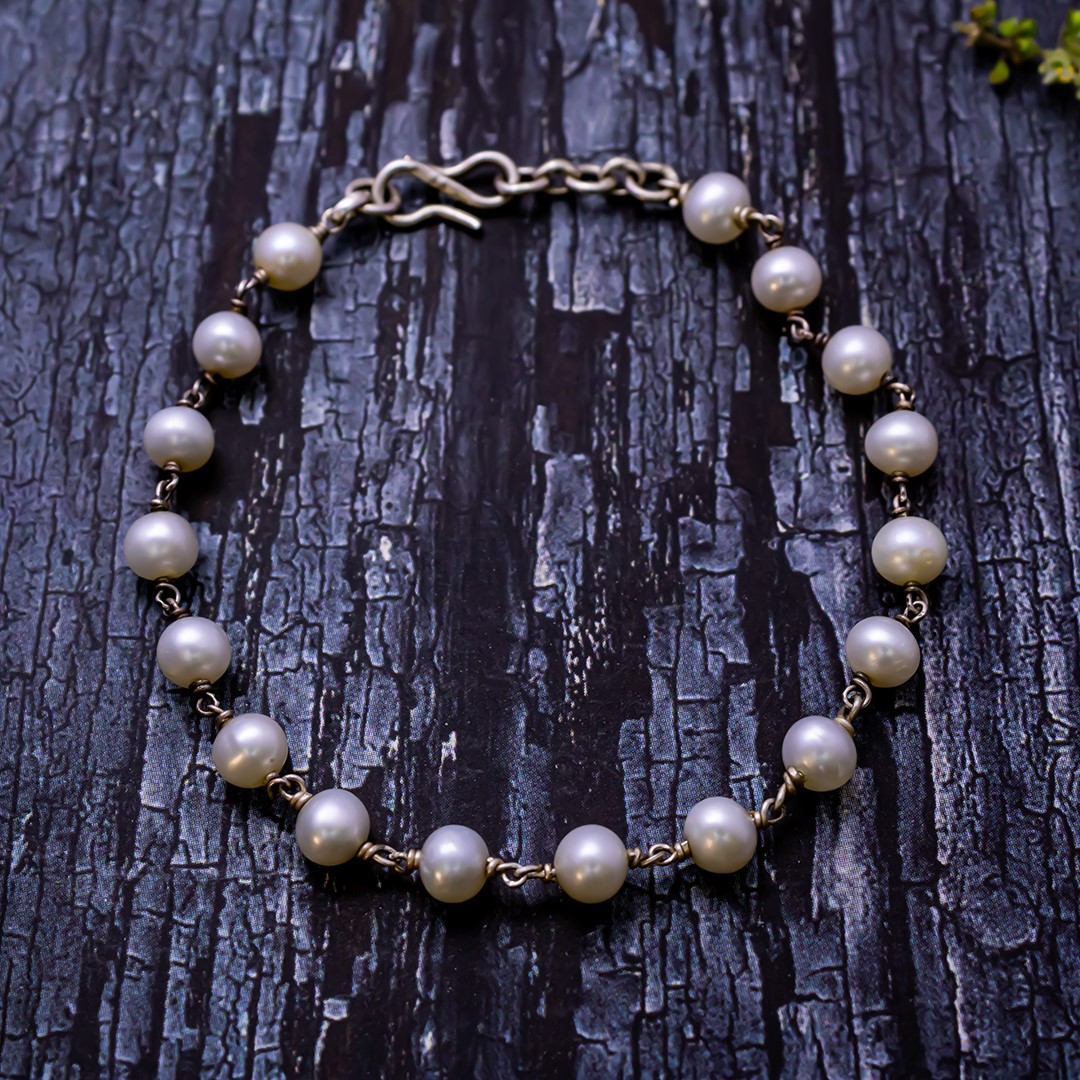 Silver charm pearl bracelet