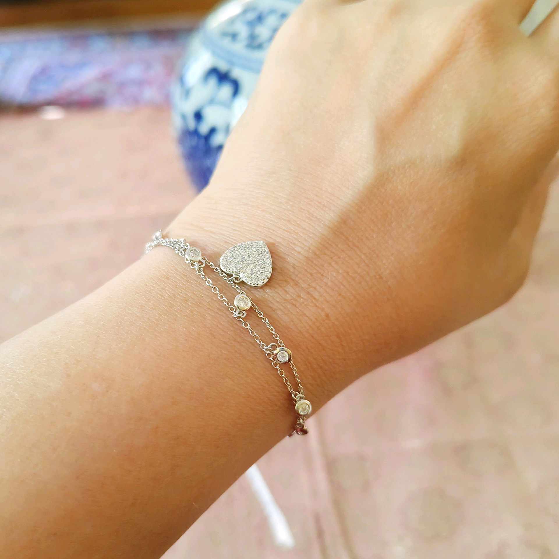 CZ heart charm bracelet in silver 