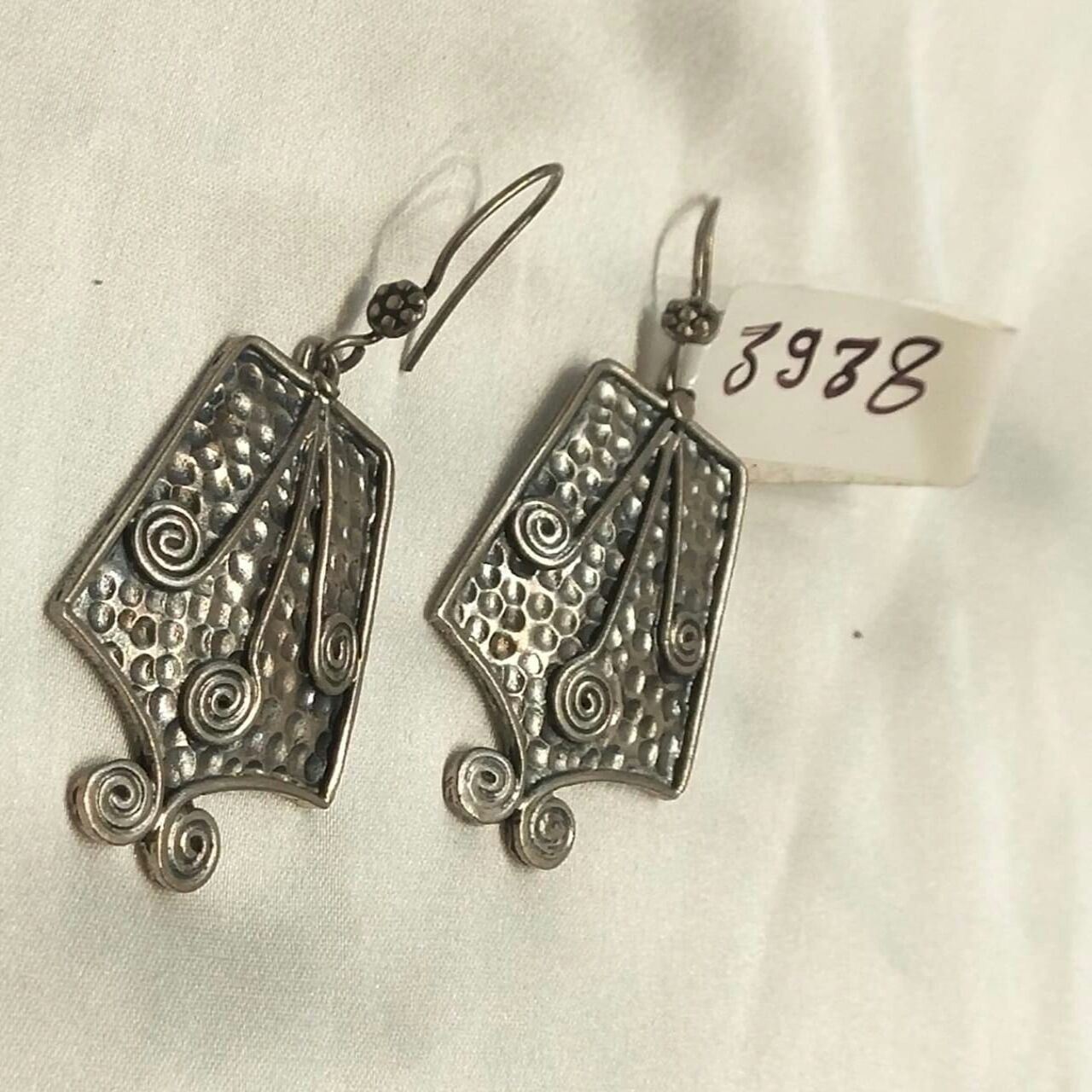 iconic silver antique earrings 