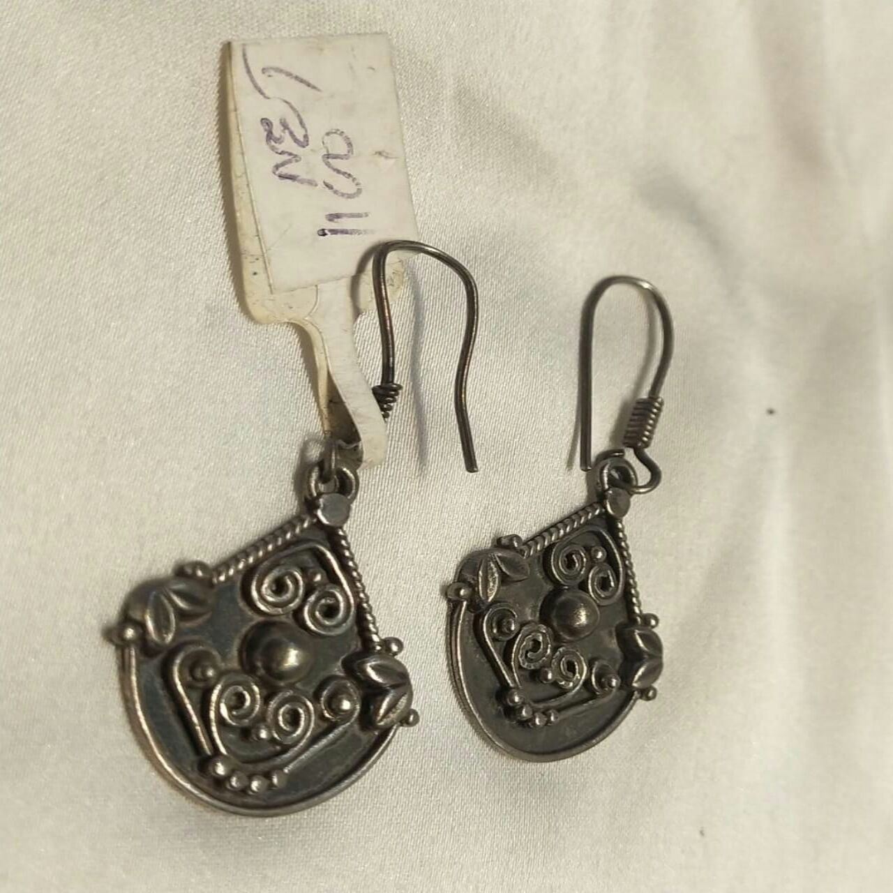 iconic silver antique earrings 