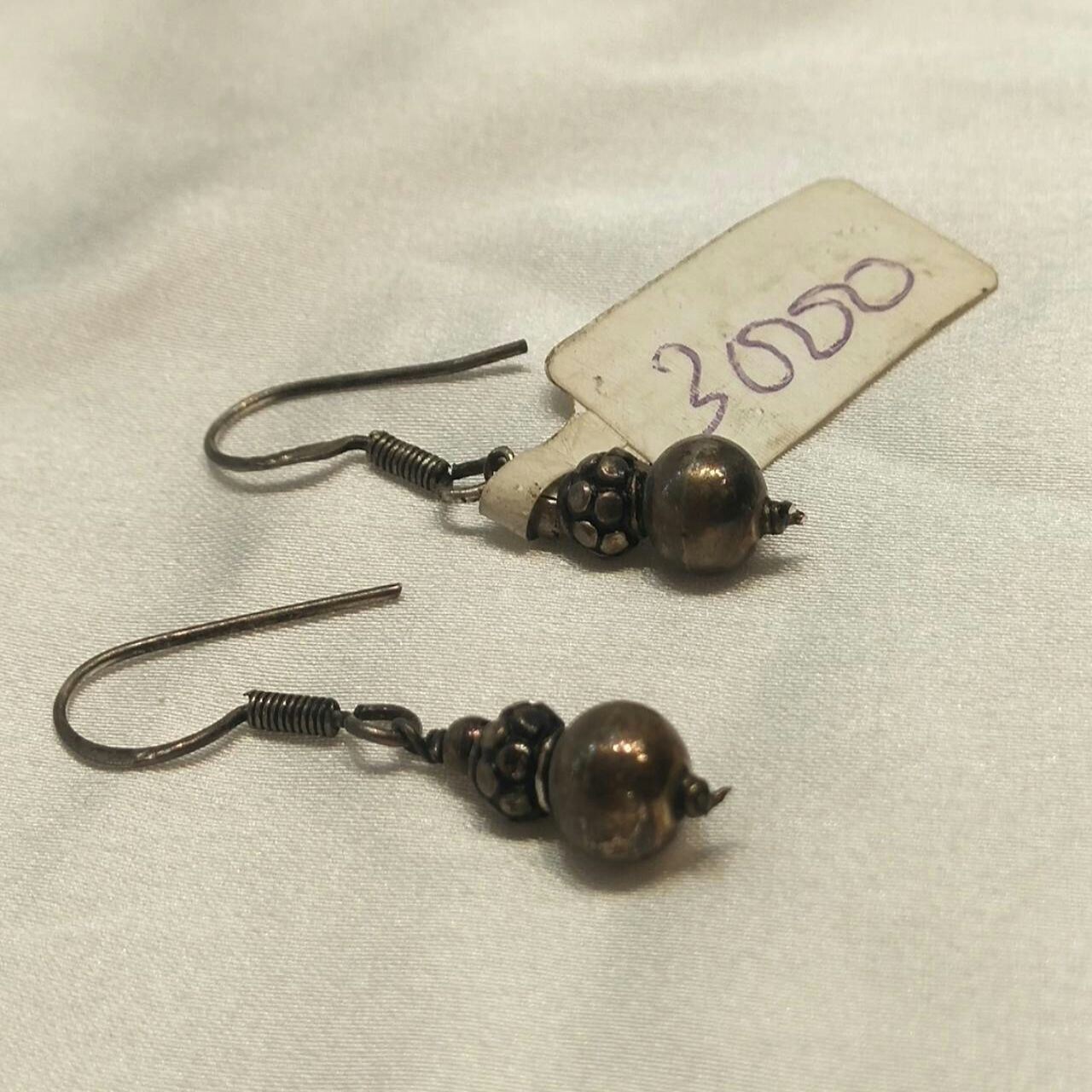 iconic silver antique earrings 